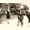 Forest Home ca 1944
Allie Fay Fillingim on bicycle -Erin Howard at 'horses mouth' -Bud Bower head rider and Cardy Howard in saddle with Bud