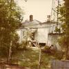 Forest Home  - Kitchen area. To the right stands the old water tower with well house below.