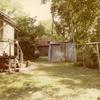 Forest Home  - Kitchen area. To the right stands the old water tower with well house below.