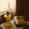 Forest Home - Old photo album and Kerosine lamp in Parlor