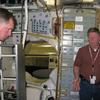 We have just entered the shuttle through the hatch in background. We are standing in the crew cabin area.