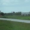 Shuttle Crew Transportation Vehicle headed to the crew quarters with the STS-131 crew on board.