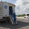 CAPE CANAVERAL, Fla. - At the Shuttle Landing Facility at NASA's Kennedy Space Center in Florida, STS-131 Commander Alan Poindexter, front, and his crew exit the crew transport vehicle following the landing of space shuttle Discovery on Runway 33