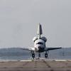 Discovery is landing on runway 33 at Kennedy Space Center.