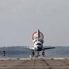 Discovery is landing on runway 33 at Kennedy Space Center.